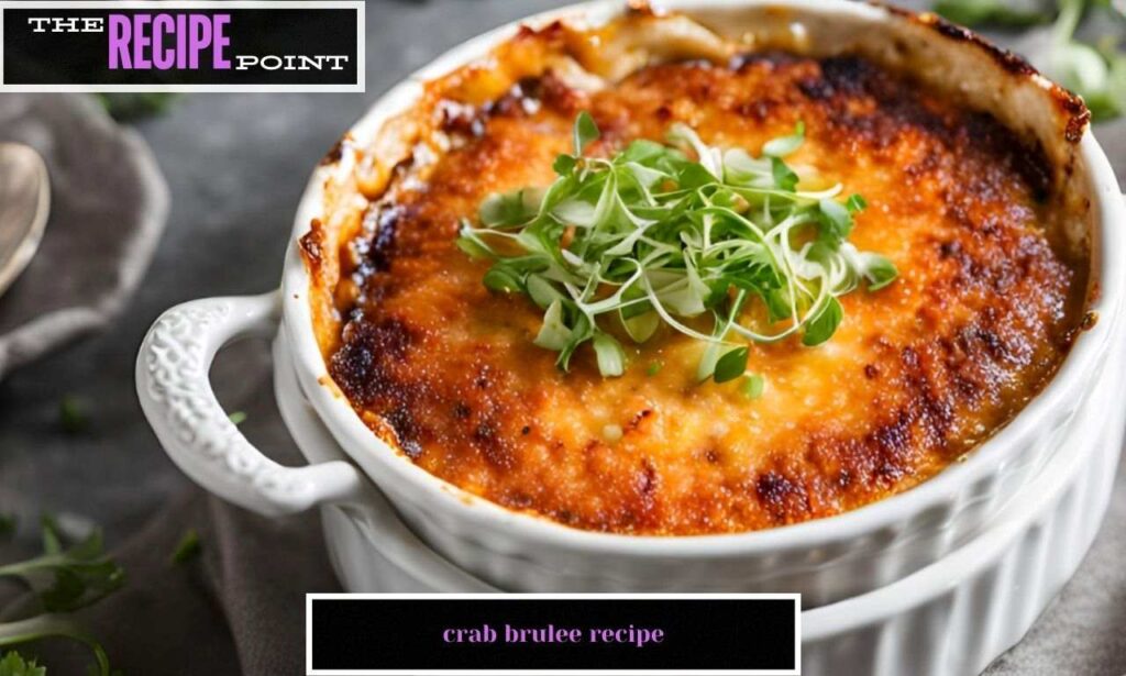 This entrée is golden crab brûlée presented in a ramekin with a sugar crust on top it is accompanied by garnished fresh herbs.